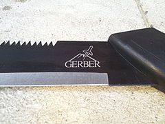 Gerber logo on machete/saw combo