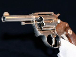 PHOTO: A Colt .38 revolver once owned by notorious gangster Al Capone, is displayed at Christies auction house, London, June 21, 2011.
