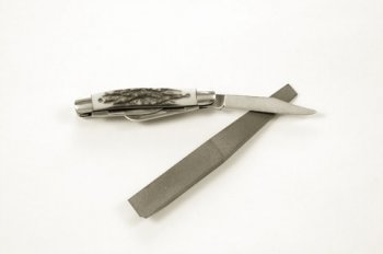 pocket knife with sharpening stone sharpener