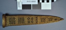Sheath of dagger from PG 580 showing open work filigree, possibly representing reed sheaths (Copy at Penn Museum 29-22-10B)