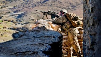 U.S. Army Sgt. Andrew Barnett armed with the M14 enhanced battle rifle outside an Afghan border police observation point in Kunar province, Afghanistan (U.S. Army photo by Sgt. Jon Heinrich)